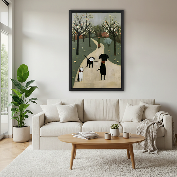 Close view of framed dog walk canvas wall art with flowering trees above small wooden tables.