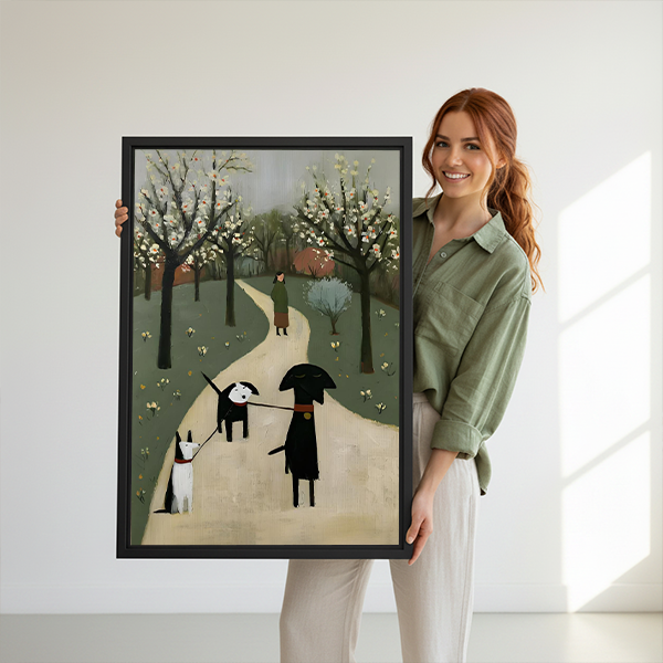 Framed whimsical dog walk canvas wall art displayed above a cream sofa in a bright living room.