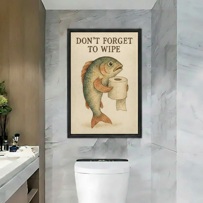 Don't forget to wipe funny fish framed canvas print hanging above toilet in marble tile bathroom