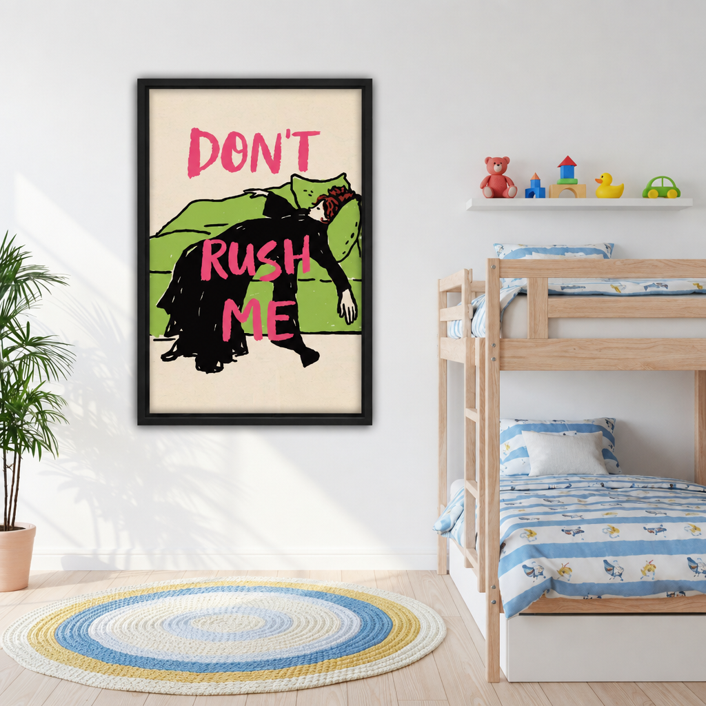 Framed canvas of vintage-style illustration of a woman in black dress draped over green sofa with bold pink "Don't Rush Me" text on cream background on white wall beside kids bunk bed
