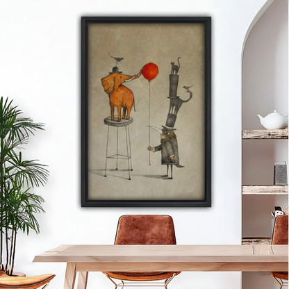 Black framed vintage storybook canvas of a golden elephant perched on a tall stool touching a red balloon with its trunk, next to a whimsical stacked cat character in a top hat holding the balloon string, rendered in warm sepia and amber tones on a parchment background, hung above a wooden dining table