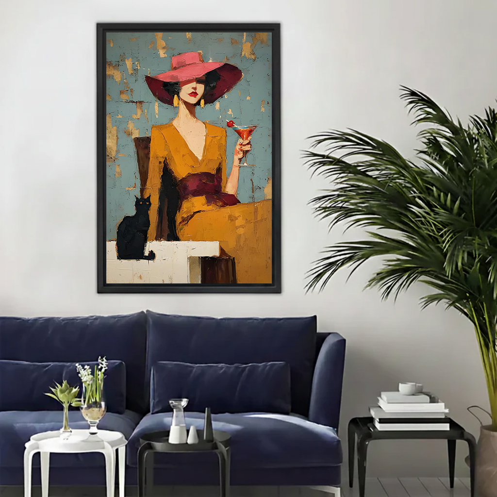 Woman holding framed fashion woman and black cat canvas wall art with a colorful cocktail.
