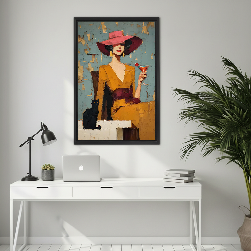 Framed fashion woman and black cat canvas wall art displayed above a cream reading chair.
