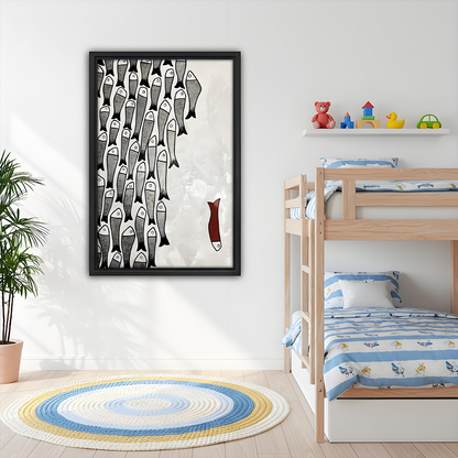 Minimalist fish school framed canvas art with red fish accent displayed in a kids bedroom