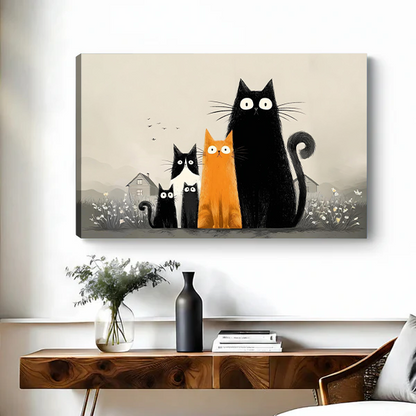 Framed five cats canvas wall art with wide-eyed black and orange cats hangs above a dark bed.