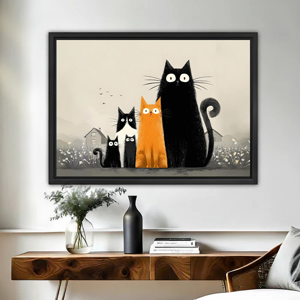 Gallery-wrap five cats canvas wall art with one orange cat hangs above a wooden console.