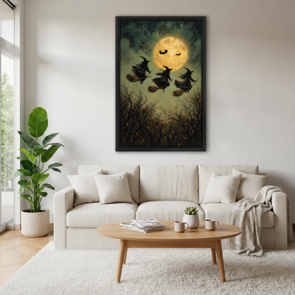 Framed flying witches full moon canvas wall art displayed above a white living room sofa