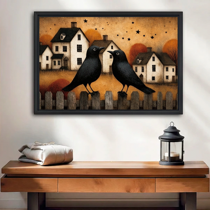 Black-framed folk art autumn crows canvas wall art above a wooden console with folded blankets and a lantern.