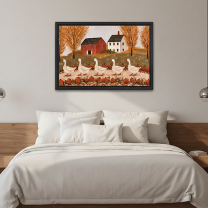 Folk art autumn geese wall art in a black frame above white bedding and a wooden headboard.