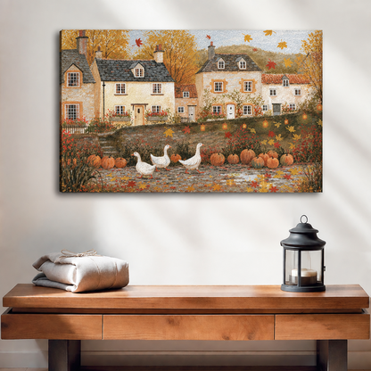 Unframed folk art autumn village canvas wall art above a wooden console with folded linens and a black lantern.