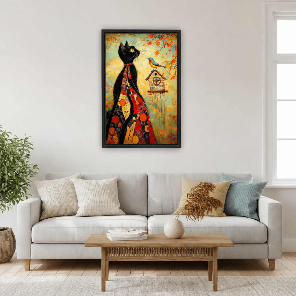 Framed folk art black cat bird canvas wall art hanging over a light gray sofa and wooden coffee table