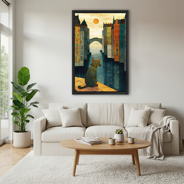 Black framed folk art cat Venice canal wall art hung above a cream sofa in a cozy living room