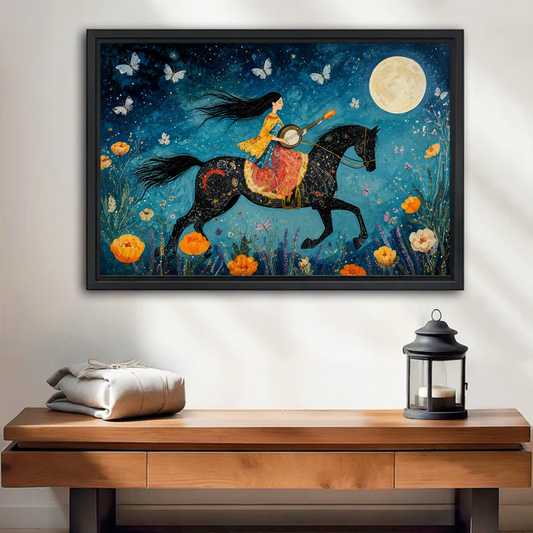 Folk art moonlit rider framed canvas wall art in black floating frame above wooden entryway console table with lantern