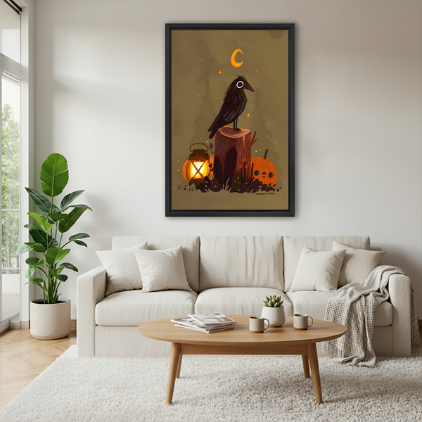 Folk art raven and lantern canvas wall art framed in black above a cream sofa and oval wood table
