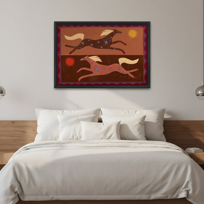 Folk art running horses blue stars red sun earth-tone black framed canvas wall art centered above solid wood headboard bed with all-white linen and paired silver globe wall sconces