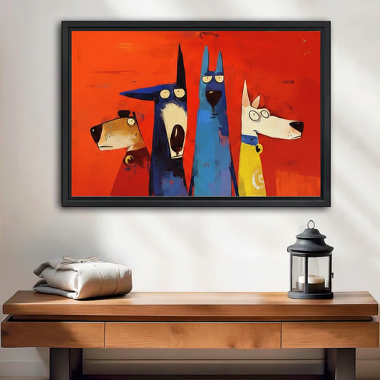 Framed canvas print of four quirky cartoon dogs on bold red background, displayed above a wooden console table