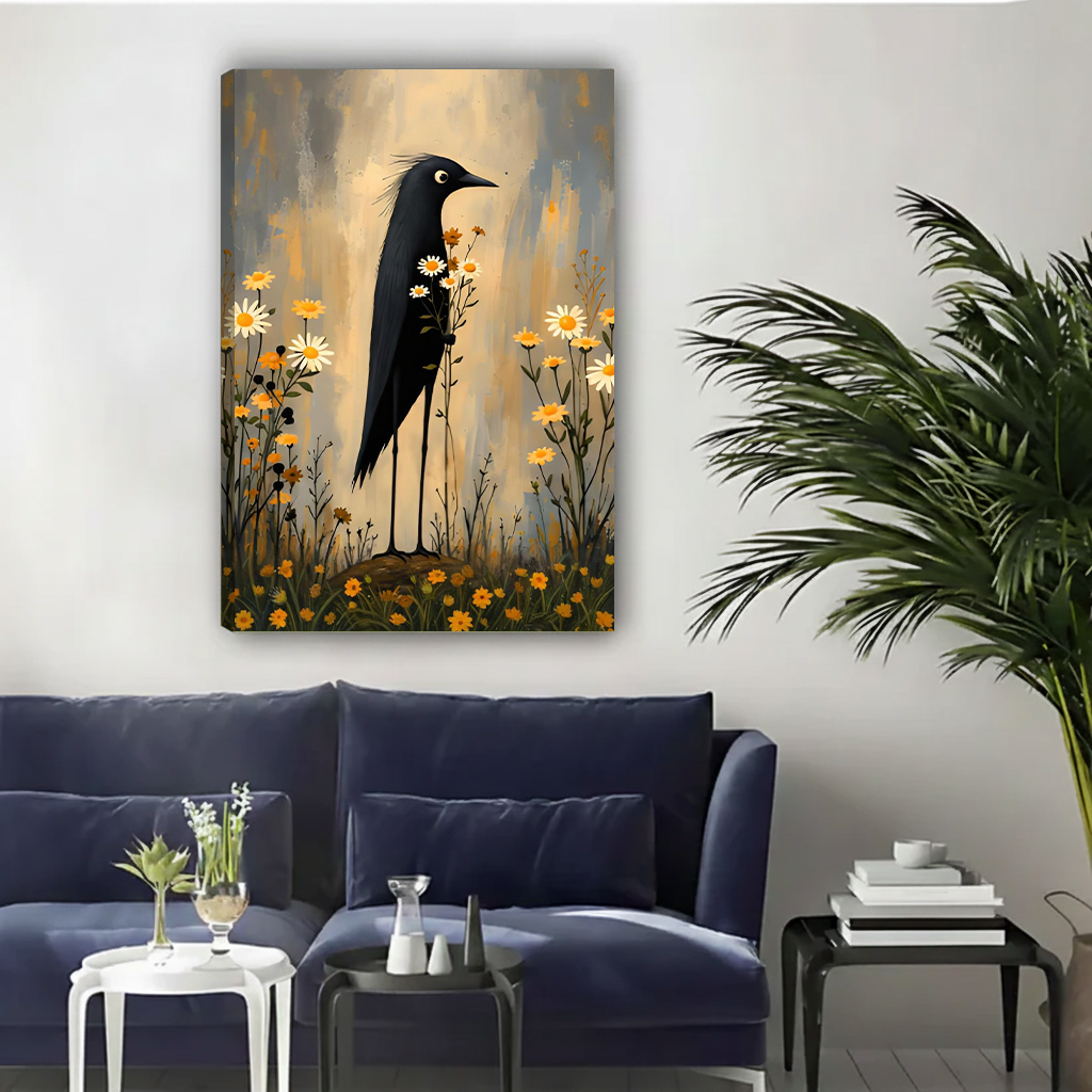 Framed black bird wildflower canvas wall art hanging above a navy sofa and side tables.