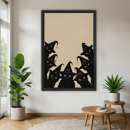 Woman holding framed black cat Halloween canvas wall art featuring witch hats in a bright room