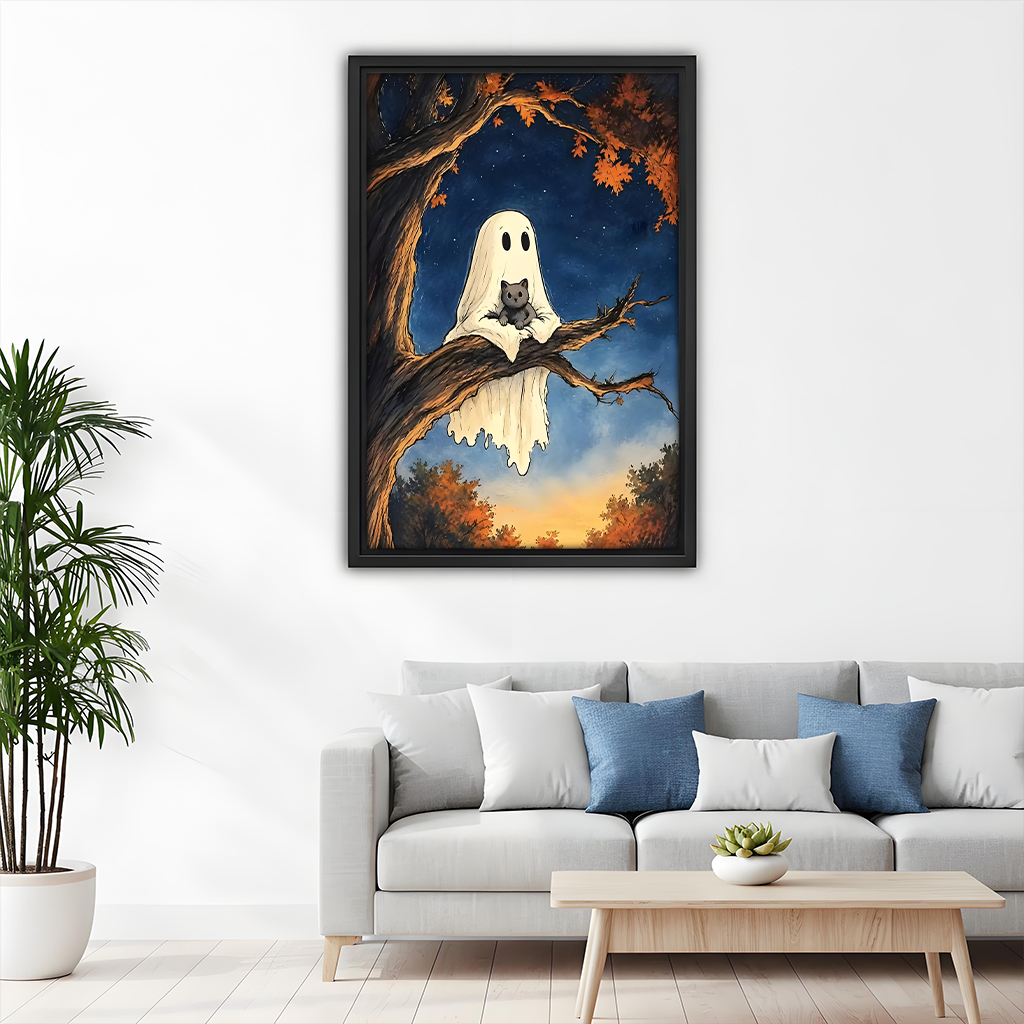 Framed ghost cat canvas wall art with autumn branches displayed above a modern sofa