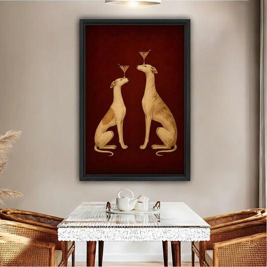Framed greyhound cocktail canvas wall art hanging above an elegant dining table with rattan chairs.