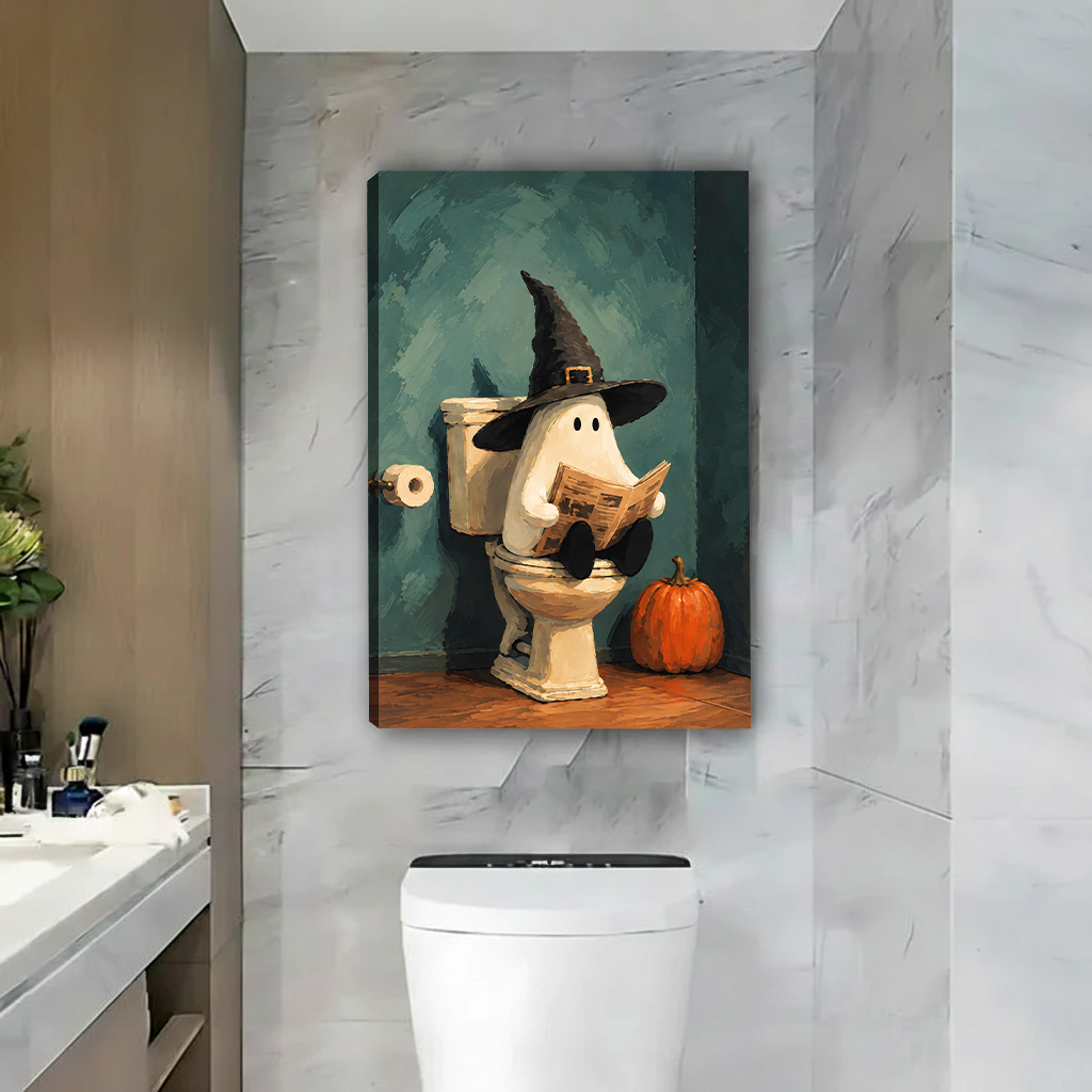Framed Halloween ghost bathroom canvas wall art displayed above a bathroom console with plants and a round mirror