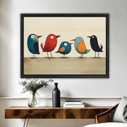 Framed playful colorful bird canvas wall art displayed above a wooden console table in a warm room