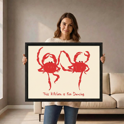 Woman holding framed playful red crab kitchen canvas wall art with two dancing crabs