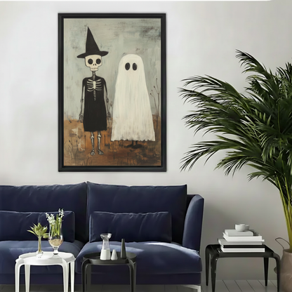 Framed witch and ghost Halloween canvas wall art displayed above a modern dark blue living room sofa.