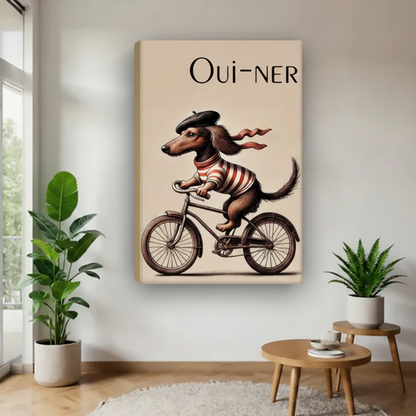 Frameless gallery wrap canvas of French dachshund Oui-ner bicycle retro poster art on white wall in bright minimalist entryway with green plants