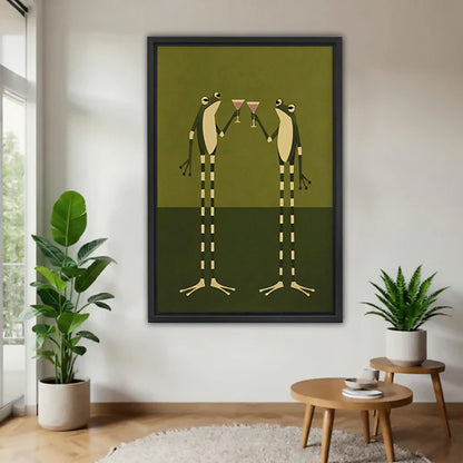 Black-framed frog cocktail canvas wall art on a white wall beside plants.