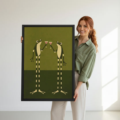 Model holding framed frog cocktail canvas wall art for size reference