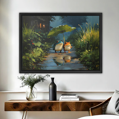 Framed frogs leaf umbrella canvas wall art hangs above a wooden console with flowers and books.