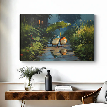 Woman holds framed frogs leaf umbrella canvas wall art showing two frogs on a rainy path.