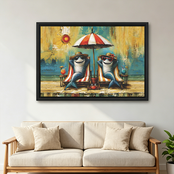 Black framed sharks with cocktails canvas wall art on a hallway wall above a wood console and lantern
