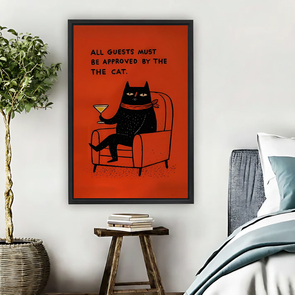 Funny black cat cocktail canvas wall art above a wooden console, showing a lounging cat with a martini glass and bold text.