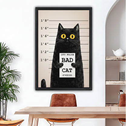 Funny black cat bad cat mugshot print in black float frame above light wood dining table with leather chairs, humorous canvas wall art in boho dining room
