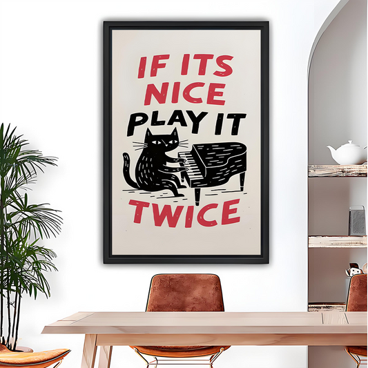 Woman holding framed funny black cat piano canvas wall art, showing the bold musical quote at full scale.