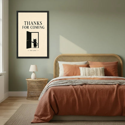 Funny cat thanks for coming framed canvas wall art on sage green bedroom wall above rattan bed with terracotta bedding