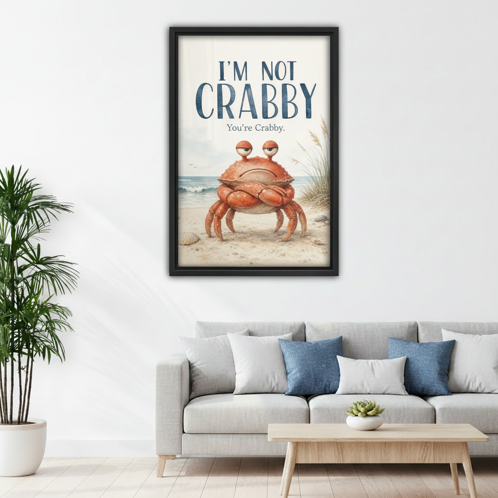 Funny crabby crab framed canvas print on white wall above gray sofa with blue pillows in modern living room