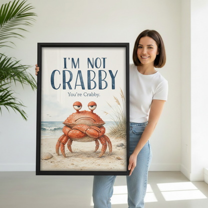 Woman holding large funny crabby crab framed canvas wall art showing size reference in white studio