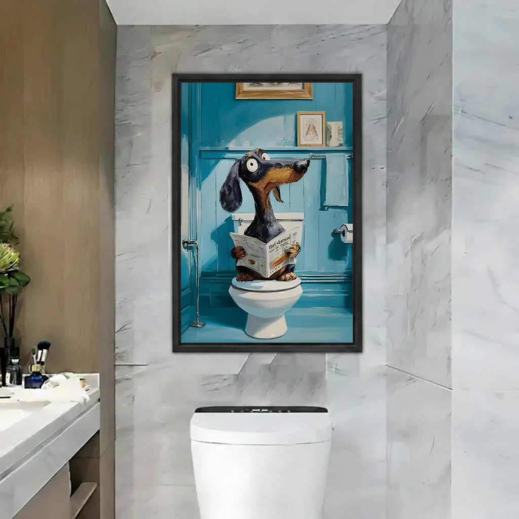 Funny dachshund sitting on toilet reading newspaper framed canvas print displayed in marble bathroom