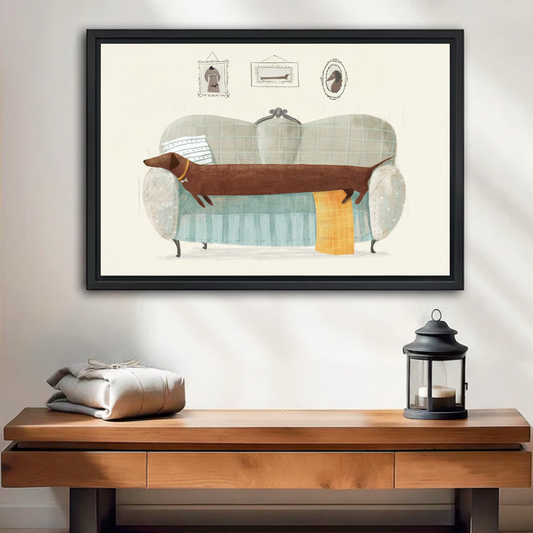  Funny dachshund dog lying across vintage blue sofa with wall portraits framed wall art above wooden console table, whimsical cartoon dog canvas for entryway