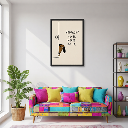 Black-framed funny dog canvas wall art with a privacy quote above a colorful sofa beside a leafy plant.