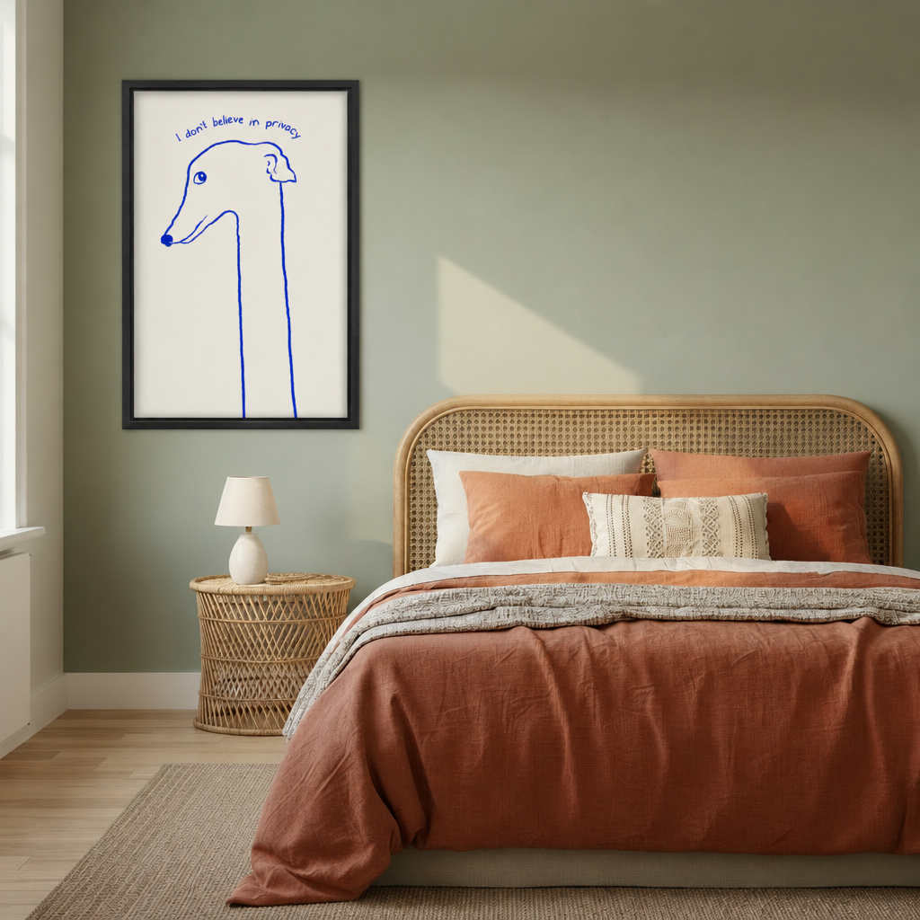 Framed funny dog quote canvas wall art displayed beside a bed with rust-colored bedding.