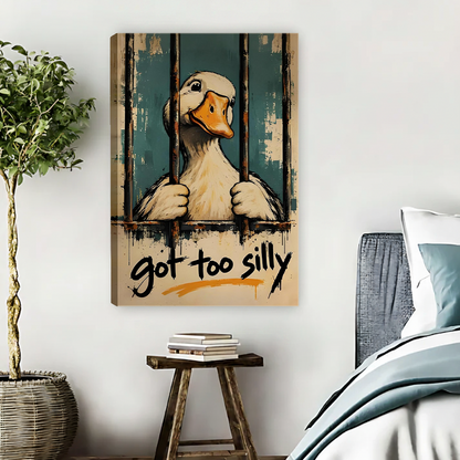 Black-framed funny duck canvas wall art showing a duck behind bars above a light living room sofa.