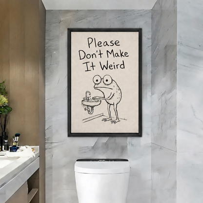 Framed funny frog bathroom canvas wall art hanging on a grey marble wall above a modern toilet