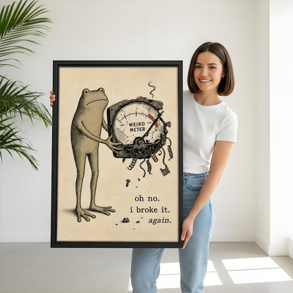 Black-framed funny frog Weird Meter canvas wall art hangs above a dining table in a bright room.