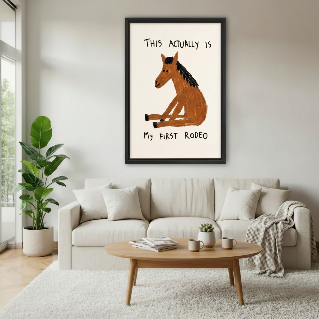 Funny horse "This Actually Is My First Rodeo" framed wall art above a neutral sofa in a minimalist living room