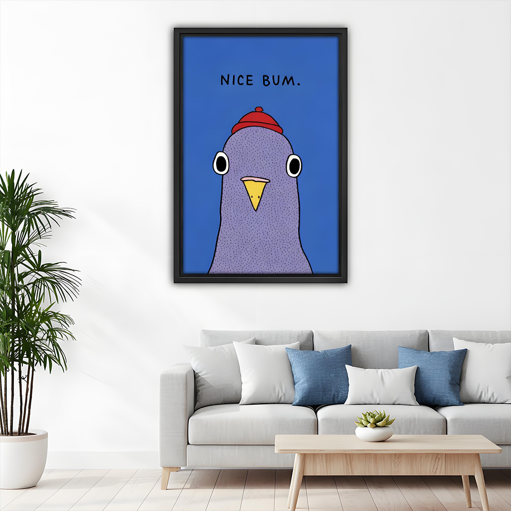 Funny pigeon Nice Bum framed canvas wall art in black frame displayed above grey sofa in minimalist living room