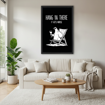 Black-framed funny polar bear canvas wall art beside a rattan bed with terracotta bedding against a green wall.